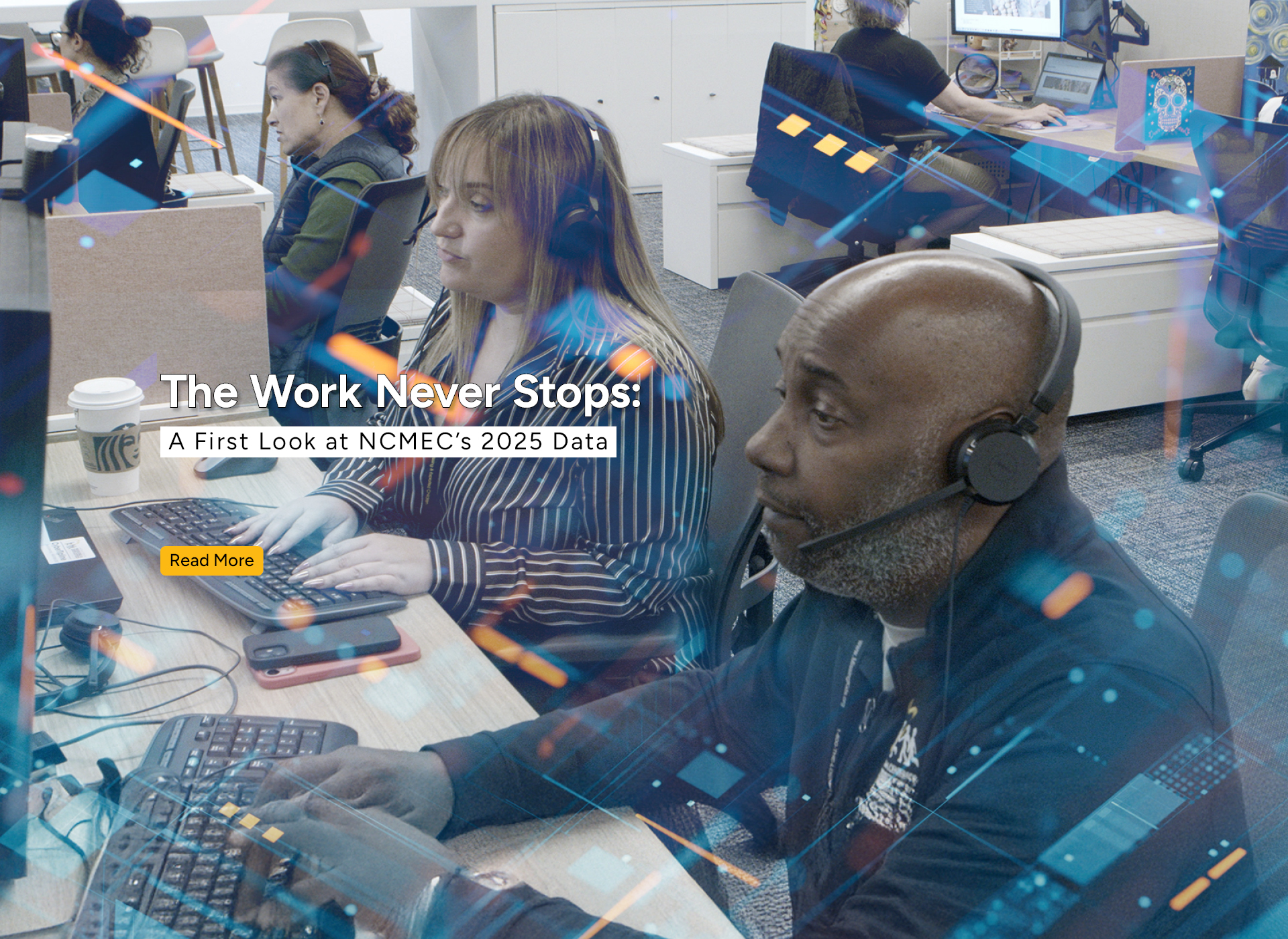 three ncmec employees sit at their desk responding to children and families in need